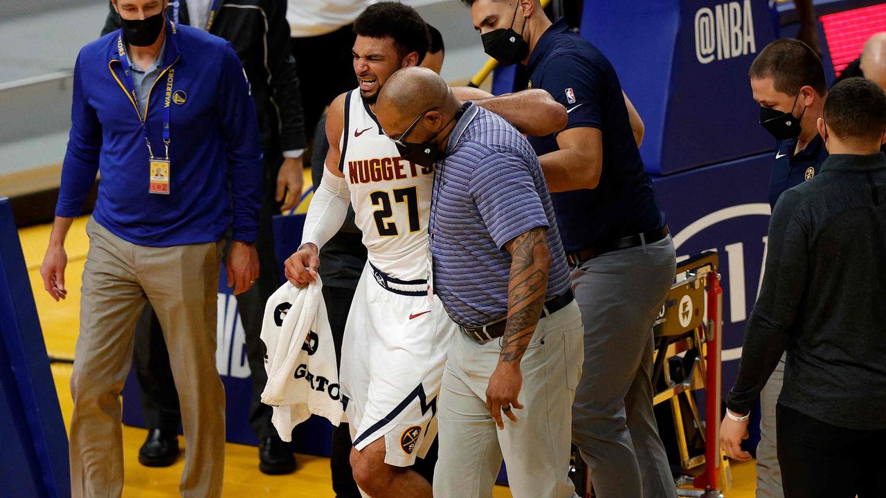 Denver Nuggets star Jamal Murray ‘devastated’ after a season-ending ACL injury, coach Michael Malone says