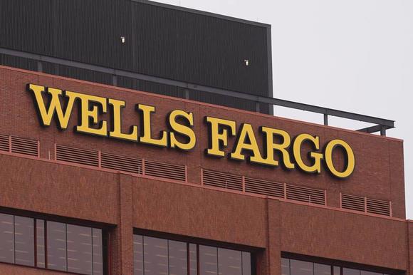 Wells Fargo’s final quarter revenue tops gauge, benefit bounces
