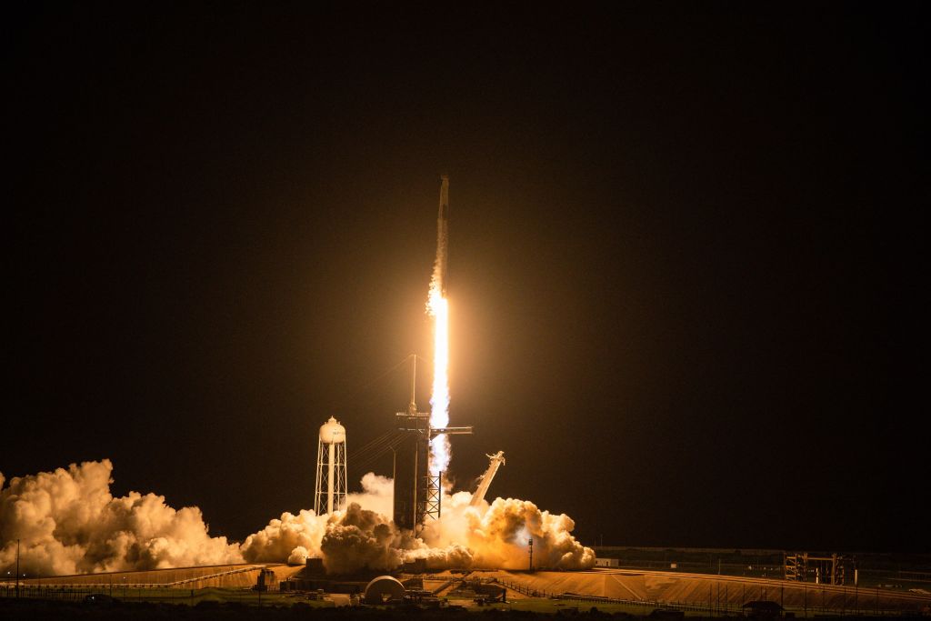 SpaceX successfully lands a rocket after launching forty OneWeb satellites into orbit