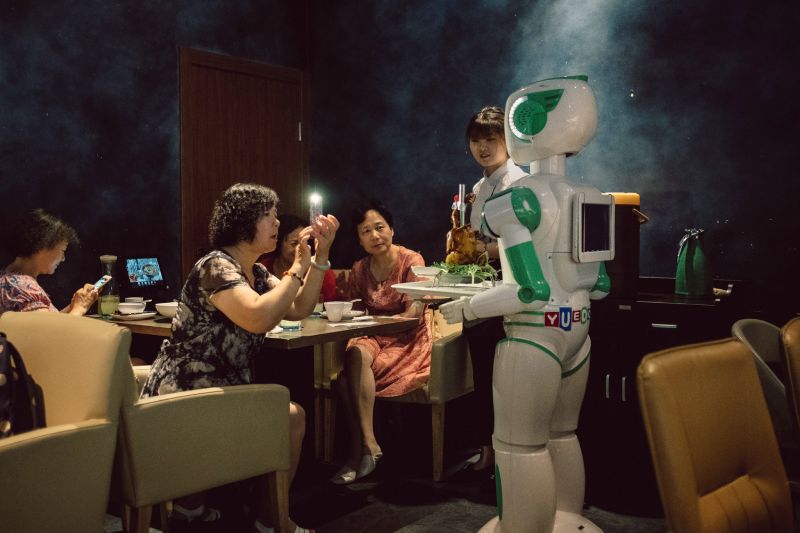 Robo-waiters from a Chinese business are ready to accept orders anywhere